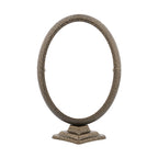 Oval aluminium photo frame with a support stand, in gold black colour.